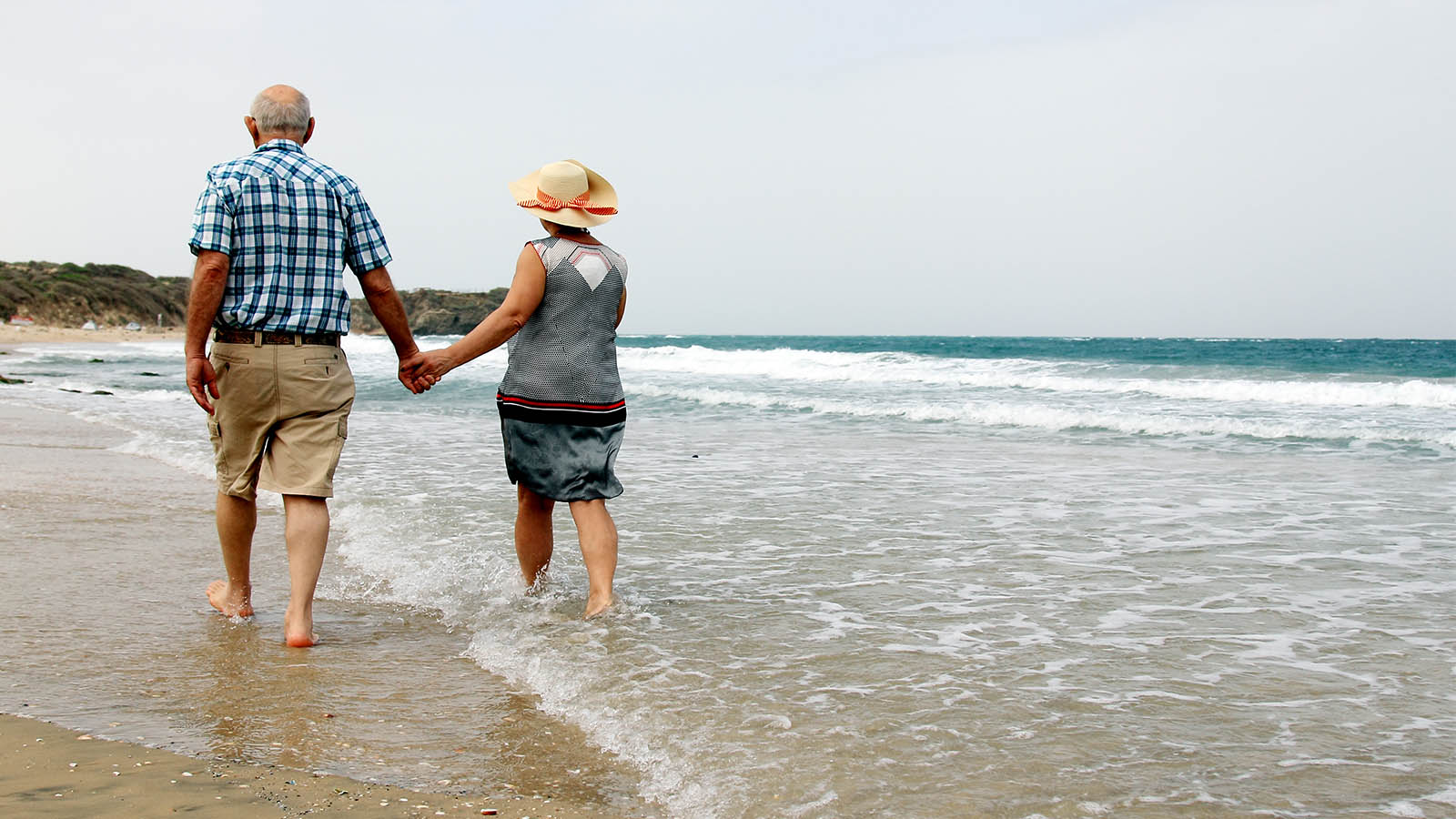 Couple walking on the beach